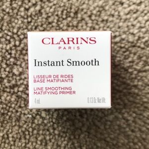 Clarins instant smooth primer.